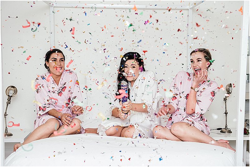 Women blowing glitter