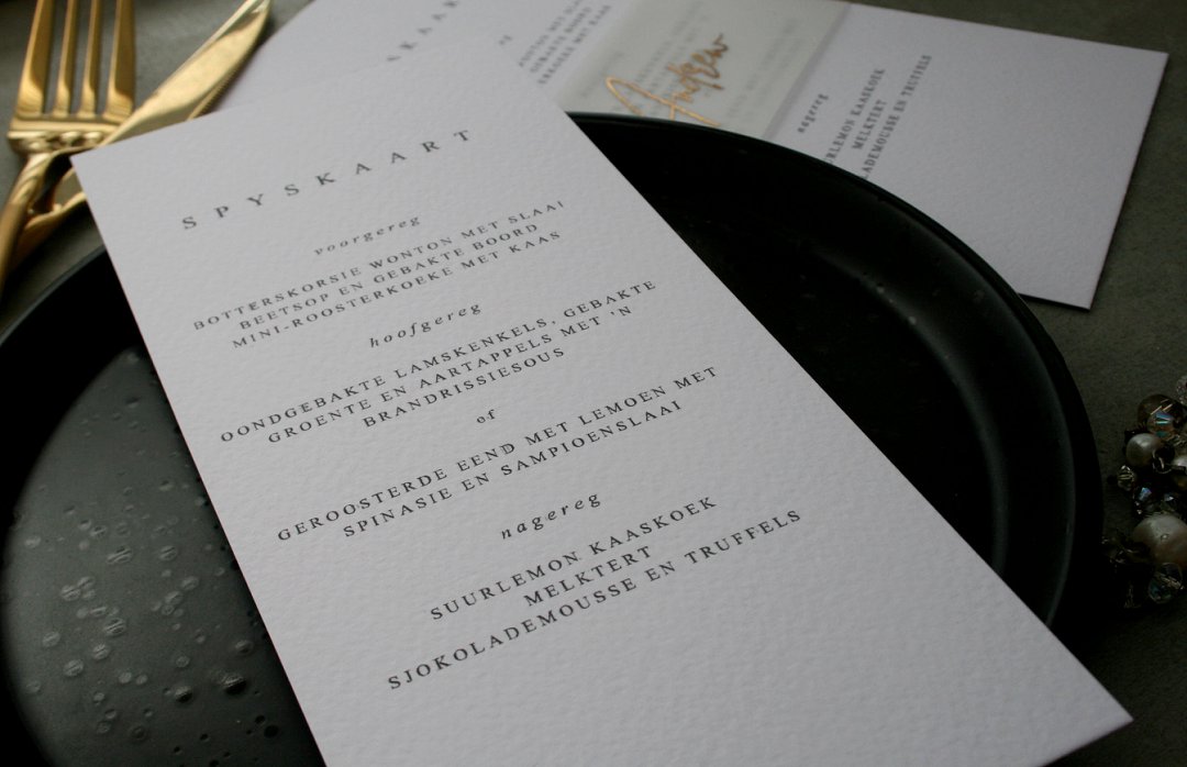Texture white, black and gold wedding menu